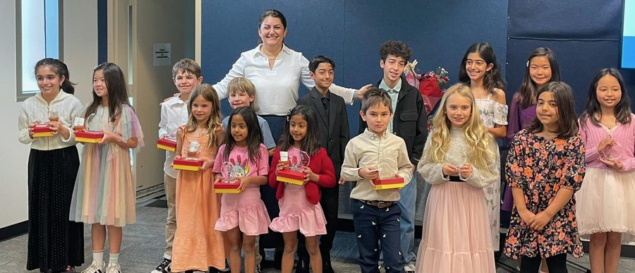 Students of the studio holding their awards with Mehrin Tavakoli after the 2025 recital
